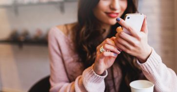Girl reads MMS text
