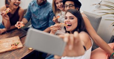group of friends take selfie