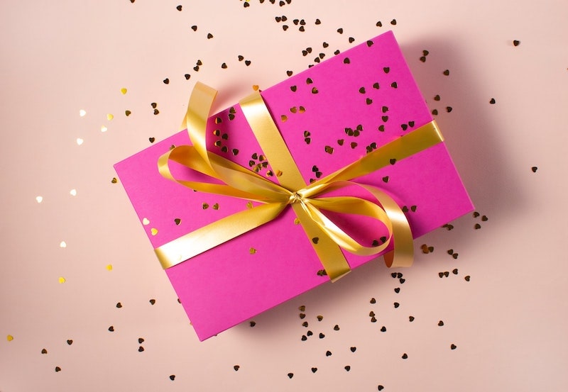 A pink present covered in glitter